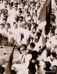 Sheikh Mujibur Rahman making his way through a sea of supporters in Lahore while he was still a Pakistani
